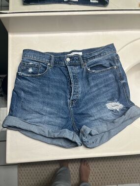 eunina Distressed Rolled-Hem Denim Shorts in Blue